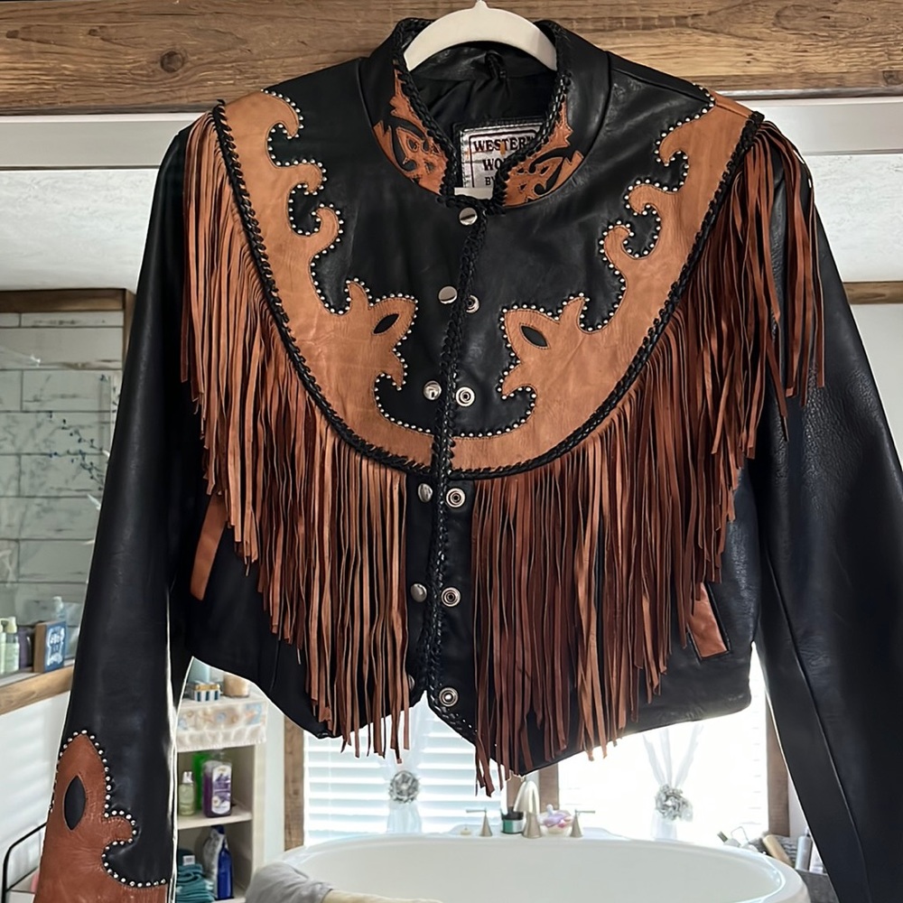 Nice black & brown leather jacket size 8 good condition